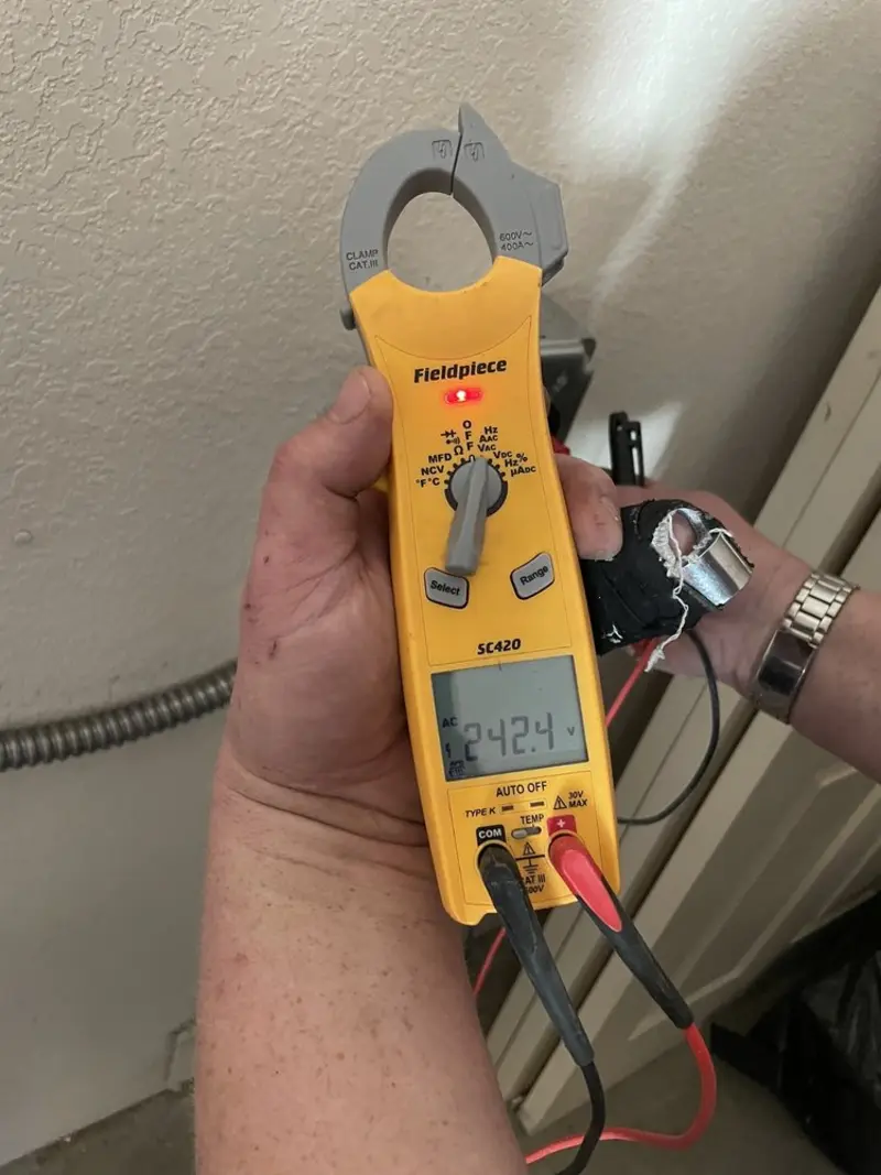 Voltage testing with clamp meter during Hot Tub / Pool Electrical Wiring in Henderson